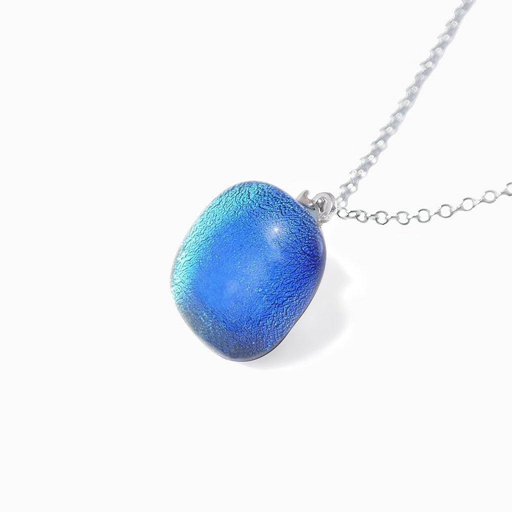NECKLACE TURQUOISE ~ NIGHT BLUE | SQUIRCLE | REFLET[proNECKLACE TURQUOISE ~ NIGHT BLUEduct_vendor]MicrocosmosPRODUCT INFORMATION

Exlusive Microcosmoses Glass Reflet
Bead size length: 14 mm / 0.55" |  width: 14 mm / 0.55"

Base chain: Sterling Silver 925 ~ Stainless Steel 
NECKLACE
